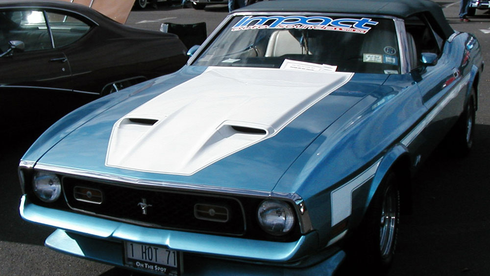 Mustang convertible top being manually closed and secured